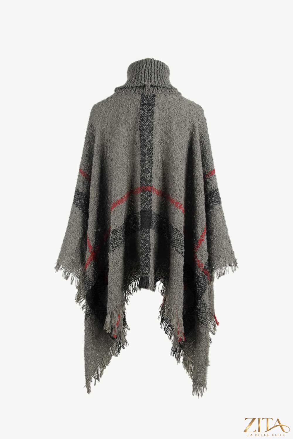 Plaid turtleneck raw hem poncho from Trendsi featuring a cozy knit design and stylish layered look.