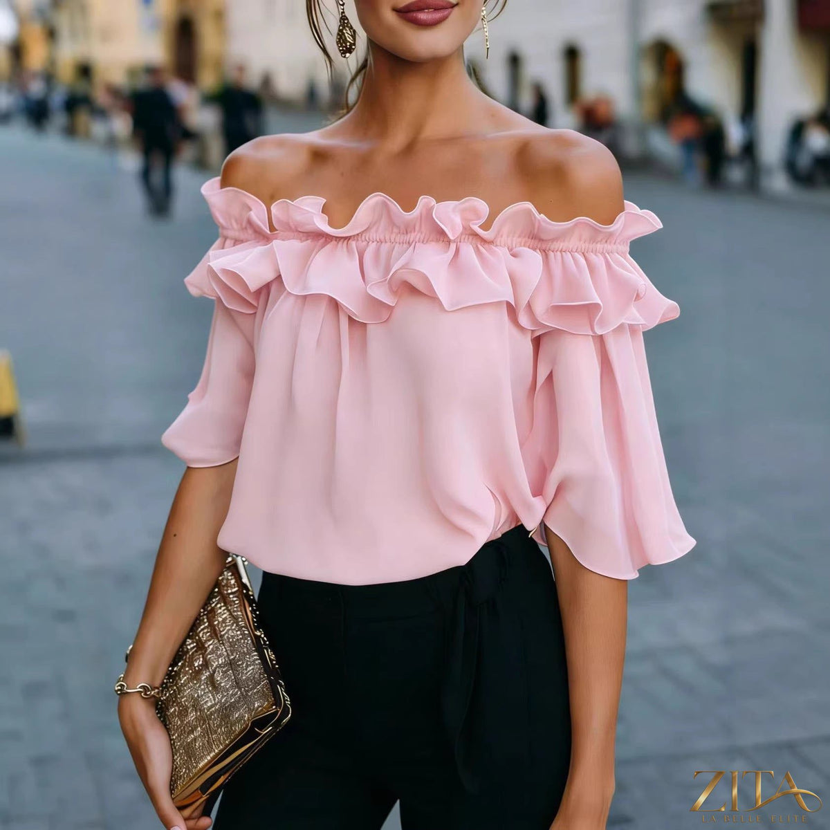 Women's loose-fit minimalist short-sleeve casual shirt by Zita La Belle Elite, shown in a relaxed fit with a simple design.