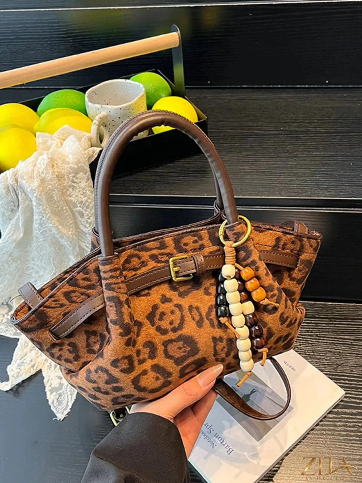 Zita La Belle Elite buckle decor tote bag with structured design and top handles, featuring stylish buckle accents on smooth material.