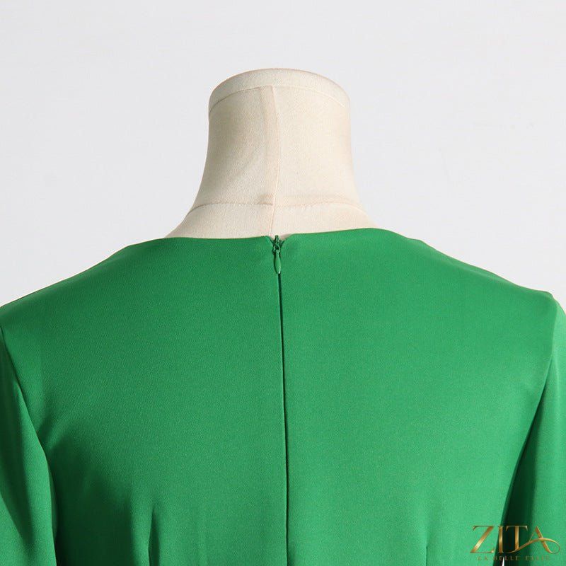 Zita La Belle Elite cape sleeve evening gown with scalloped neckline, fitted design, back slit, and elegant maxi silhouette.