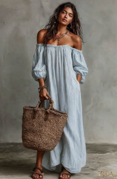 Women's off-shoulder long-sleeve maxi dress by Zita La Belle Elite, casualwear style, shown on a model with flowing fabric.