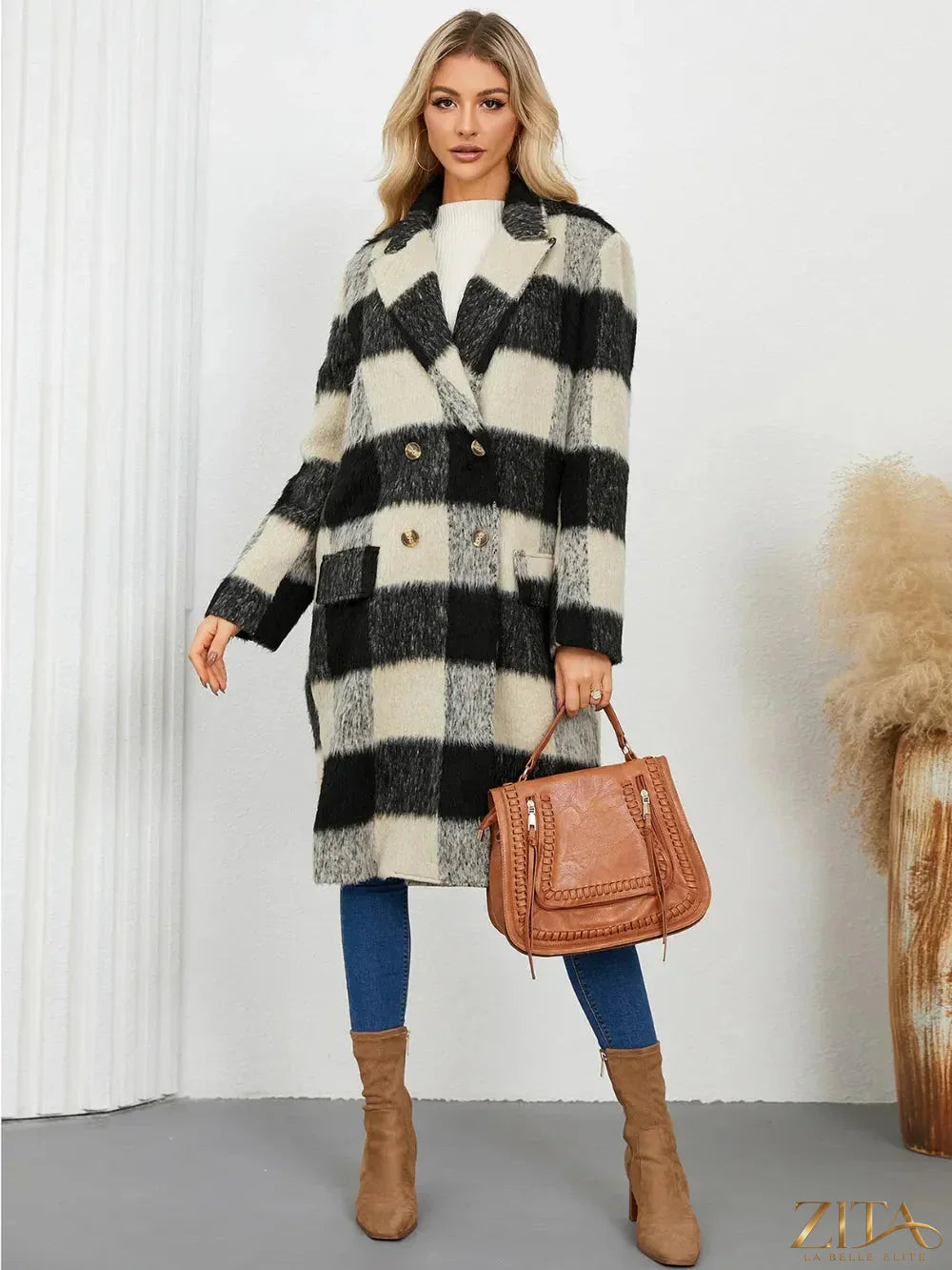 Zita La Belle Elite plaid double-breasted long sleeve coat hanging on a wooden rack with a classic pattern and tailored fit