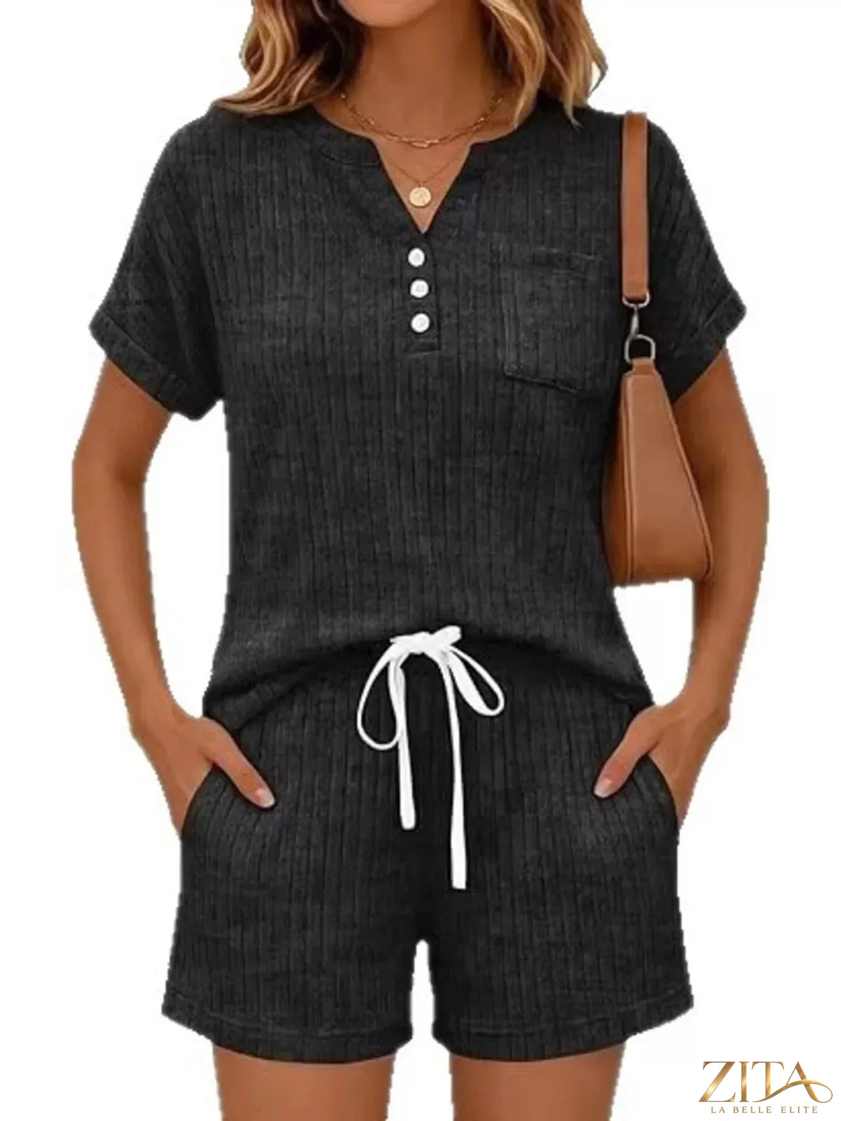 Casual ribbed knit tee and shorts set by Trendsi, featuring a comfortable, relaxed fit in soft ribbed fabric, perfect for everyday wear.