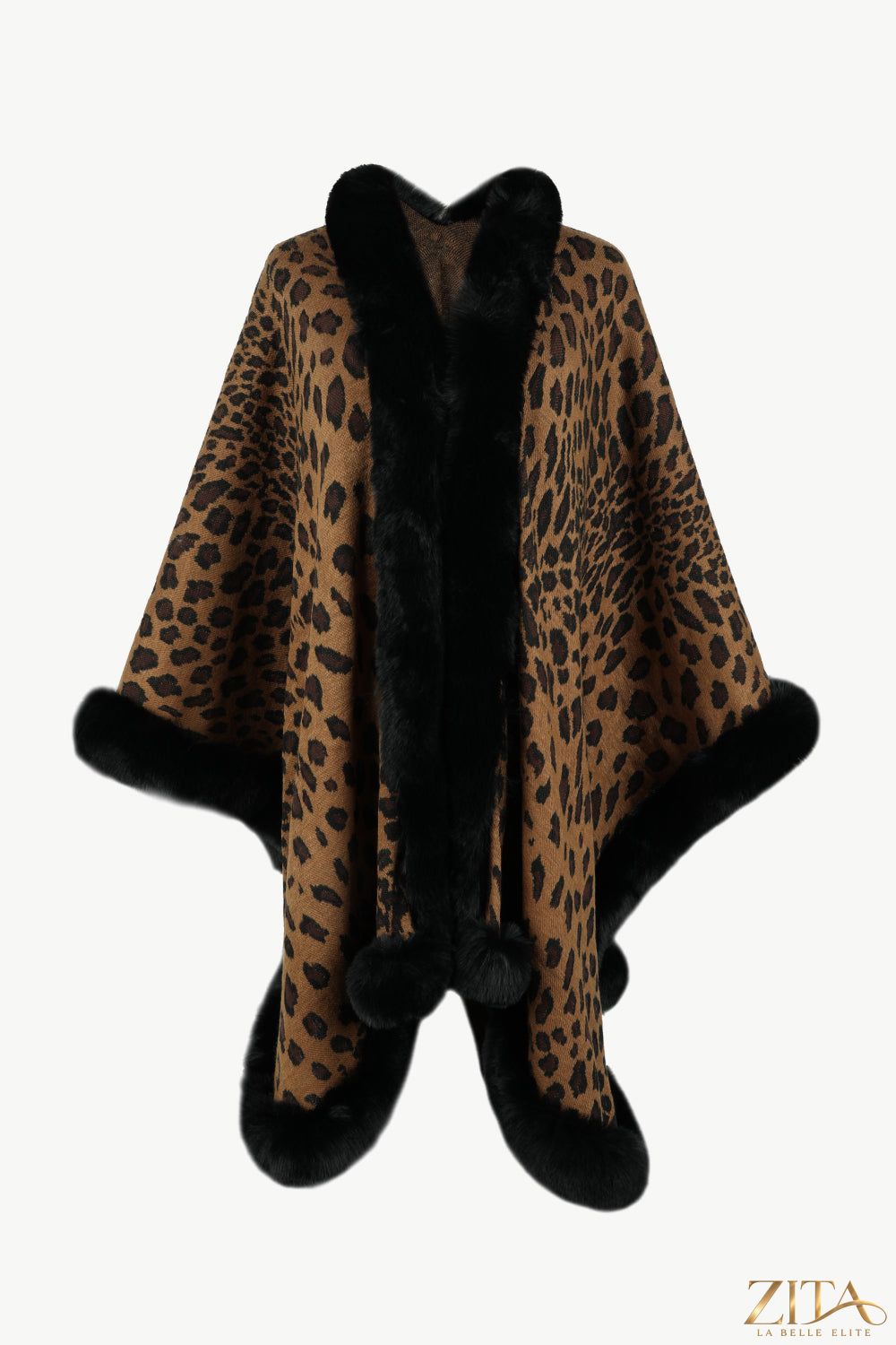 Leopard open front poncho by Trendsi featuring a stylish animal print and relaxed fit, layered over a casual outfit.