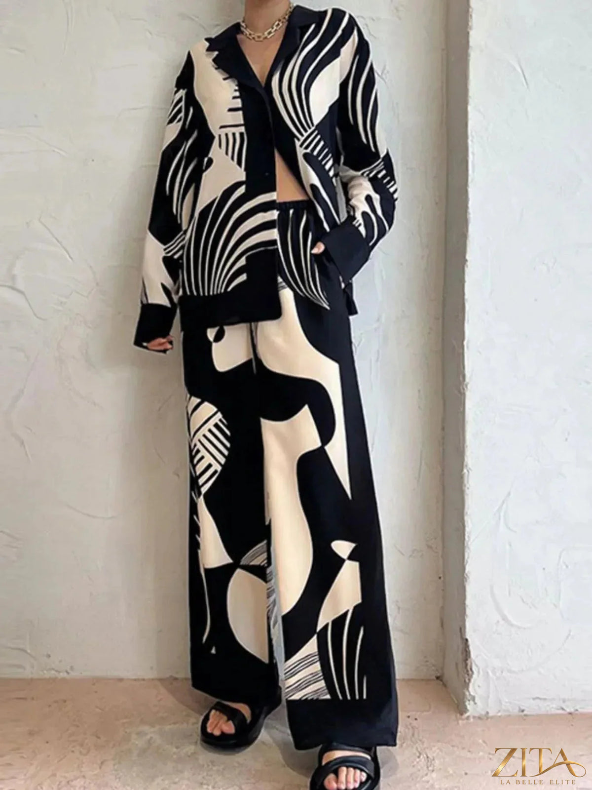 Printed long sleeve shirt and pants set by Zita La Belle Elite, featuring colorful floral patterns and comfortable fabric.