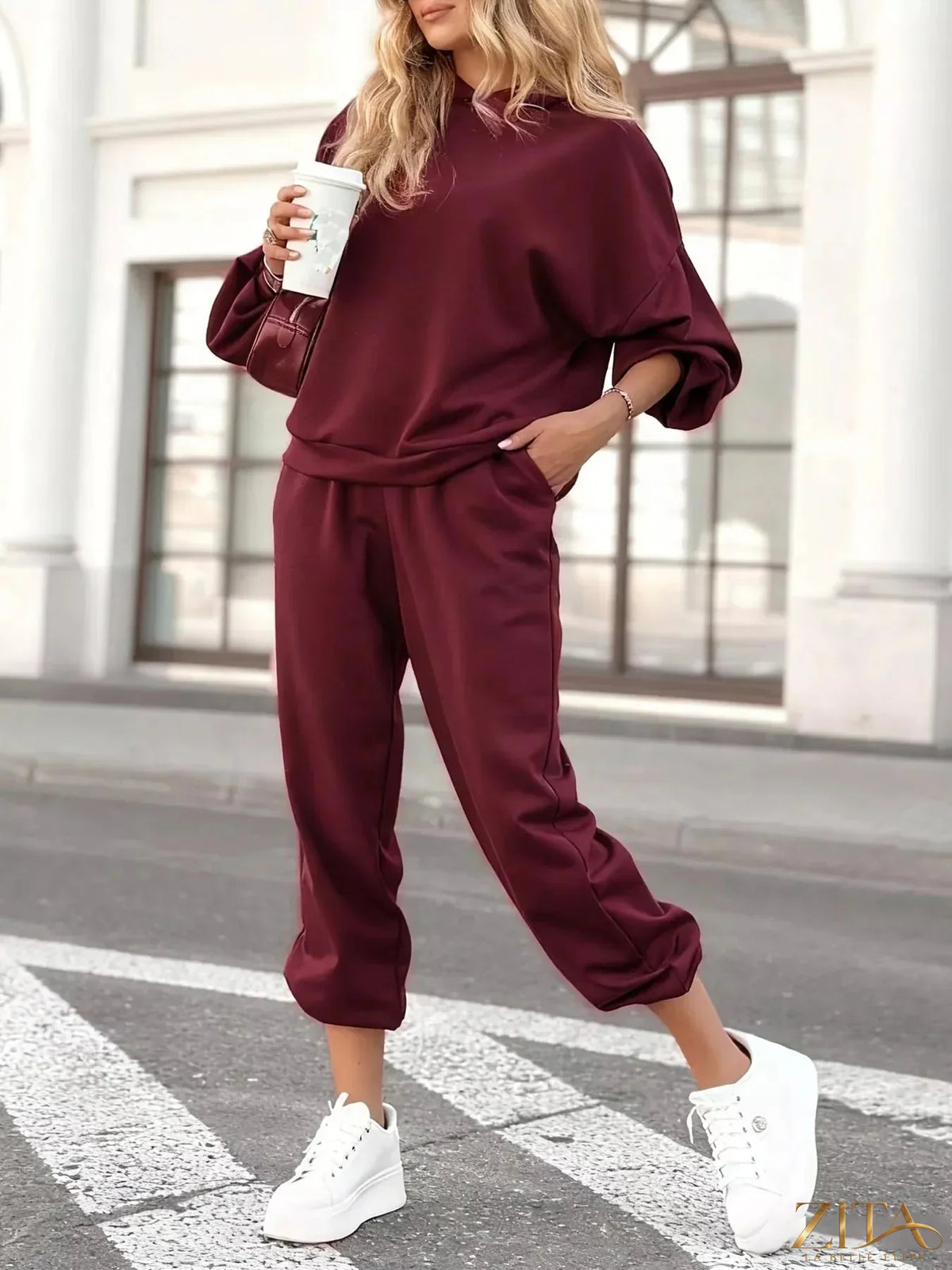 Zita La Belle Elite casual hoodie and cropped pants set in soft fabric, featuring a relaxed fit and stylish design.