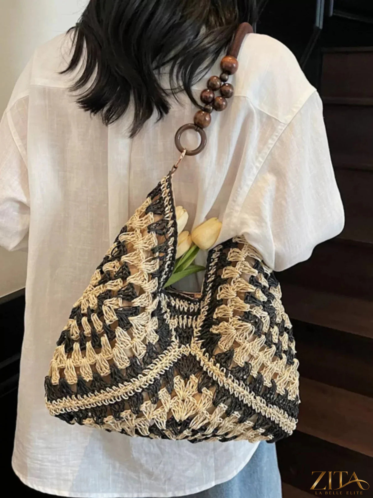Crochet hobo handbag by Zita La Belle Elite featuring a woven design, shoulder strap, and spacious interior for casual style.