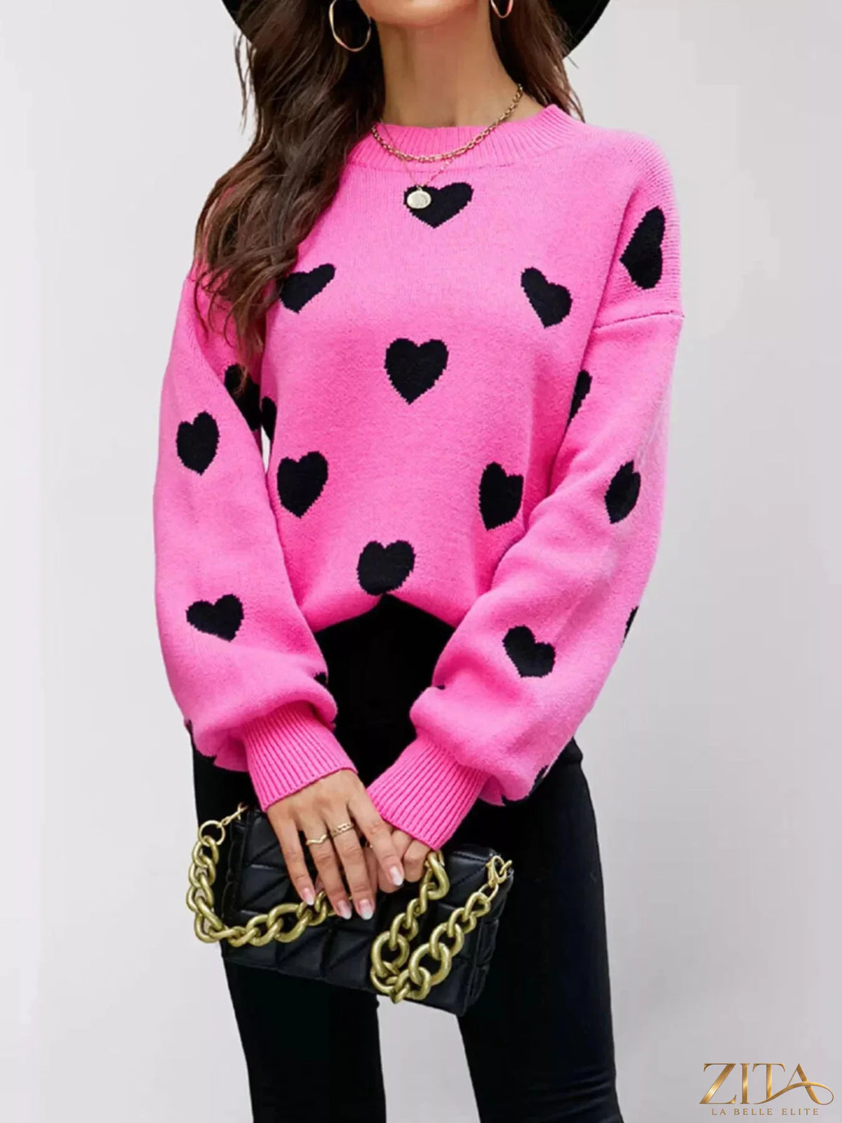 Heart-patterned dropped shoulder sweater by Zita La Belle Elite, featuring a cozy knit with romantic heart designs.