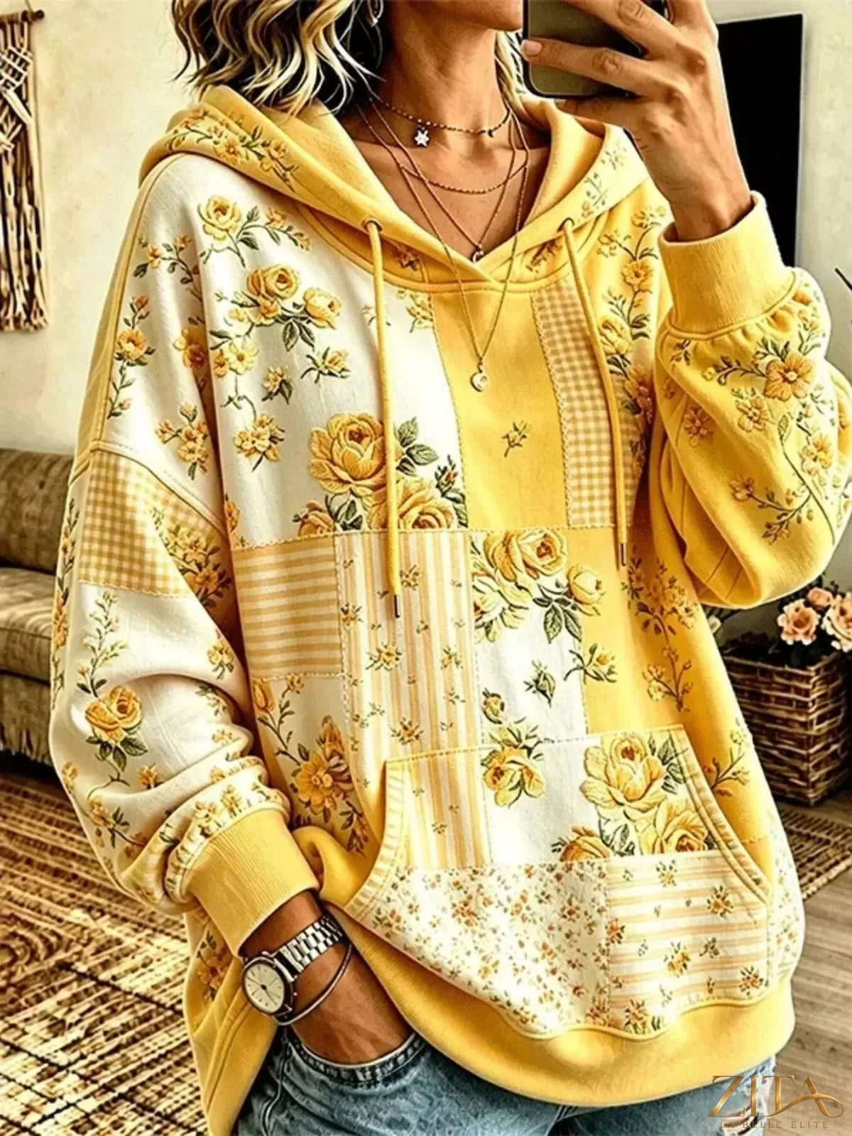 Plus size floral dropped shoulder hoodie with drawstring, casual style from Zita La Belle Elite, featuring a relaxed fit and floral design.