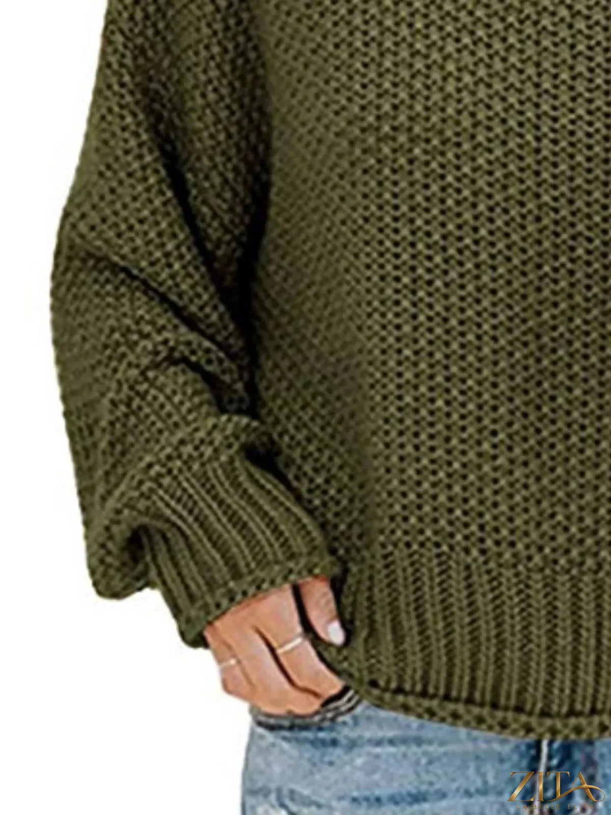Zita La Belle Elite chunky knit turtleneck sweater in cozy cream with thick textured yarn and ribbed cuffs.