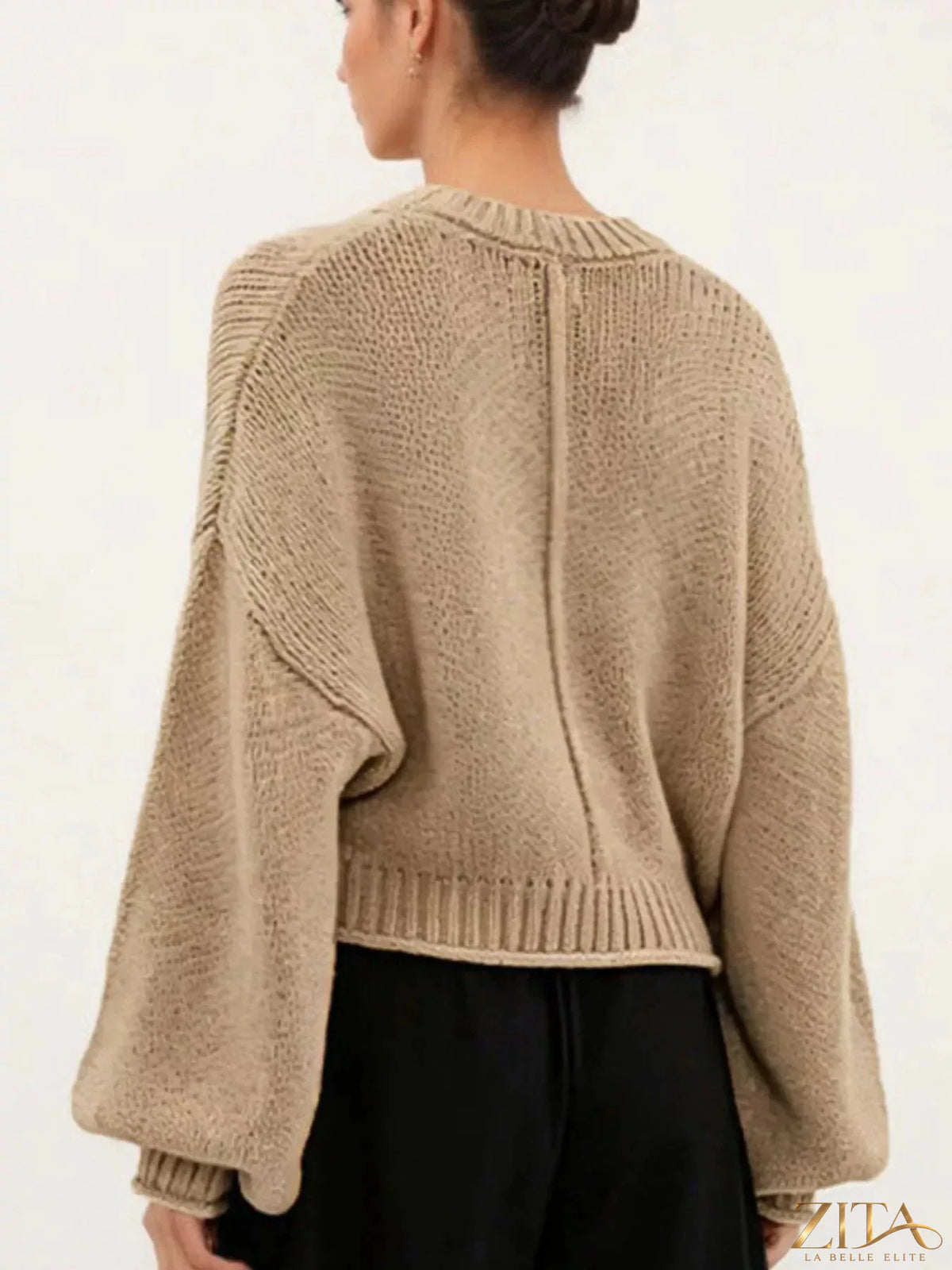 Oversized chunky knit sweater by Trendsi, featuring a cozy, thick knit design in neutral tones, perfect for casual wear.