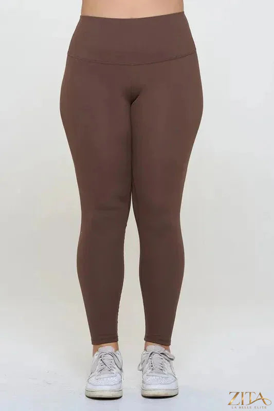 Black fleece-lined high-waisted leggings by Yelete, showing the soft, cozy interior and sleek, stretchy exterior design.