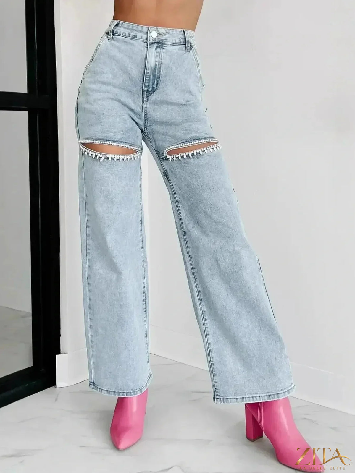 High waist cut-out wide leg jeans by Zita La Belle Elite, showing the stylish fit and design details on a model.