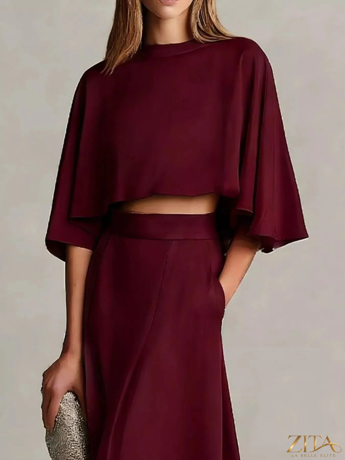 Plus size satin crop top and maxi skirt set by Zita La Belle Elite, featuring a stylish two-piece satin ensemble.
