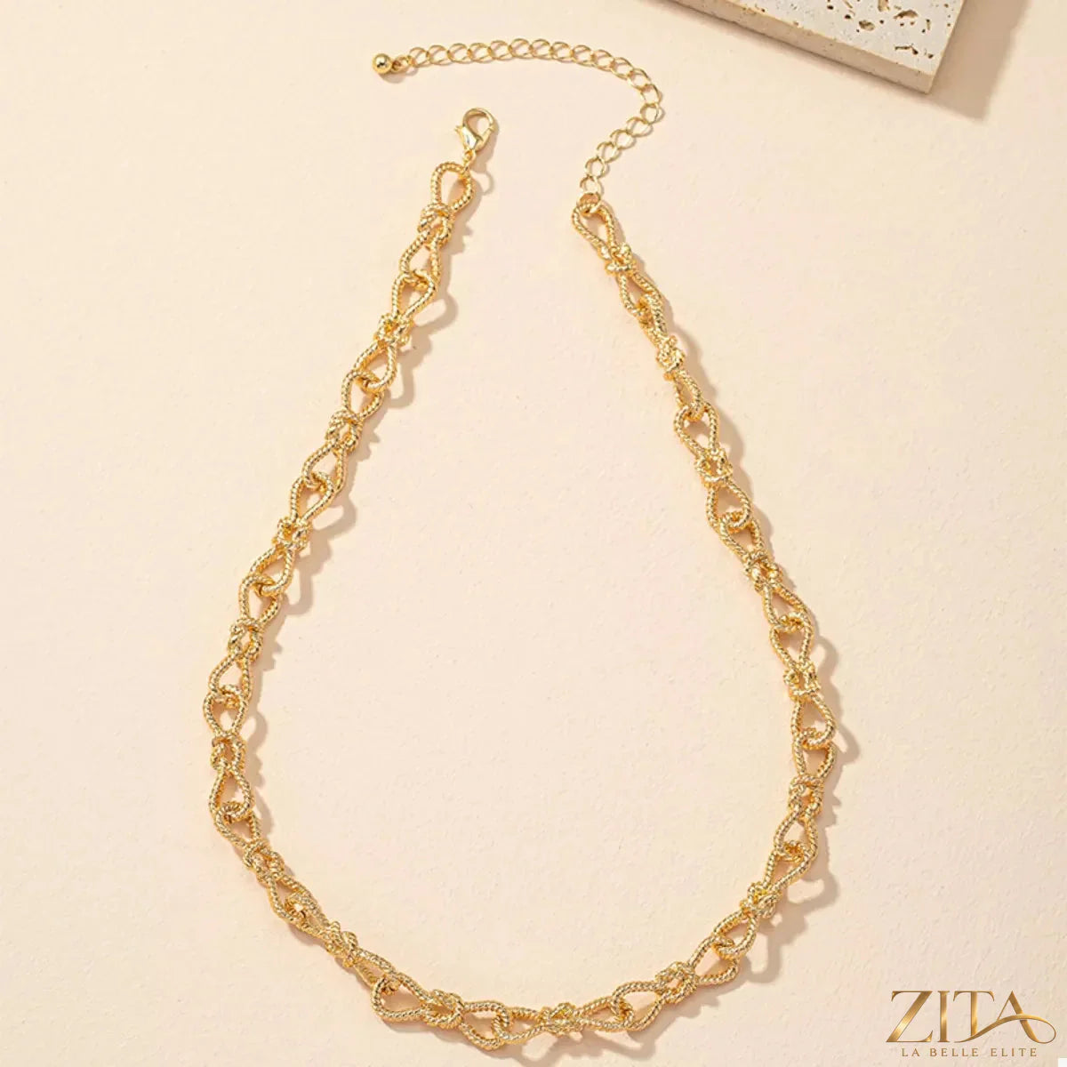 18K gold-plated chain link necklace by Zita La Belle Elite, showcasing a close-up of the elegant, polished chain links.