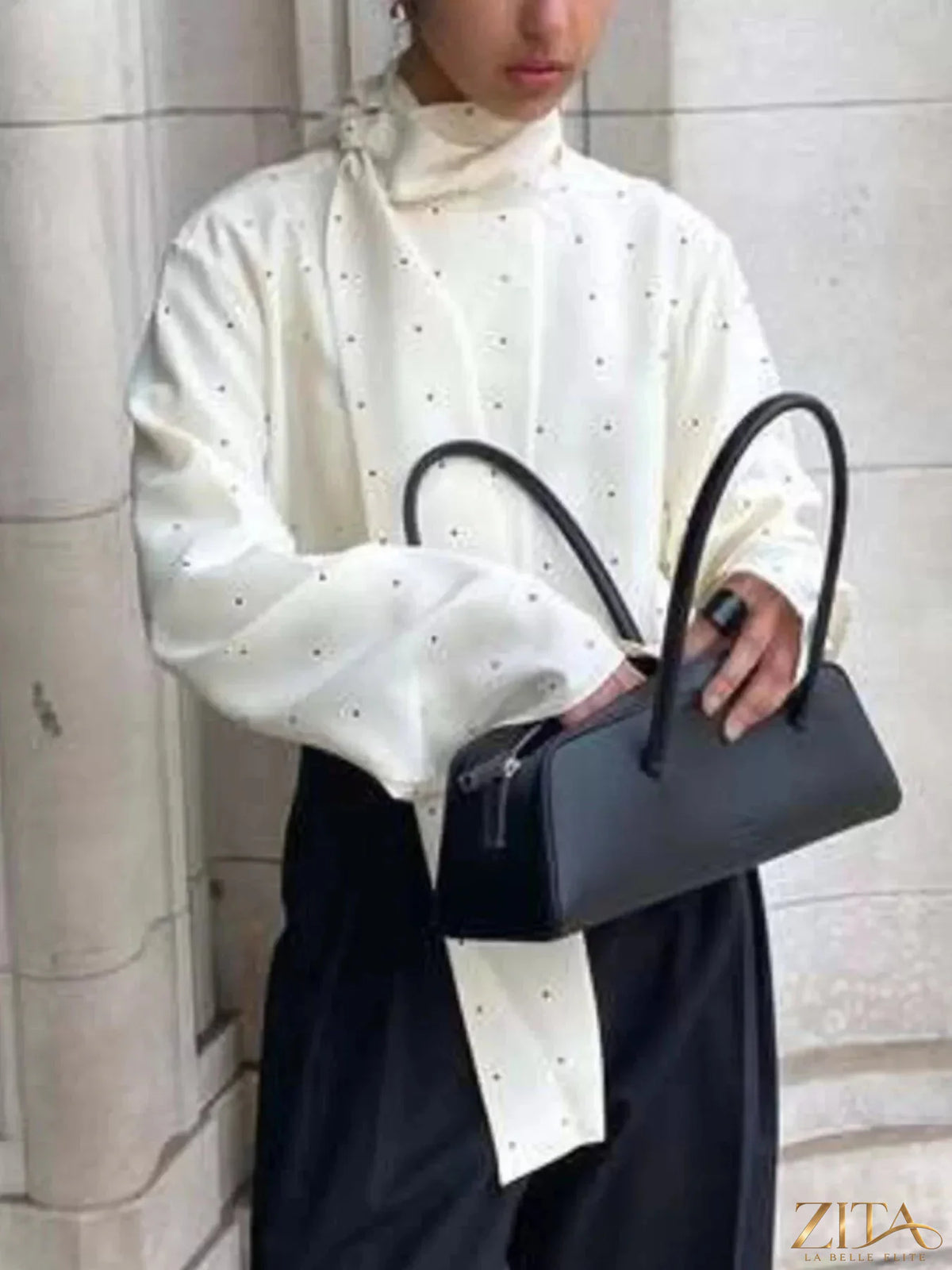 Zita La Belle Elite polka dot silk blouse with a scarf neck tie, featuring a stylish and elegant design.