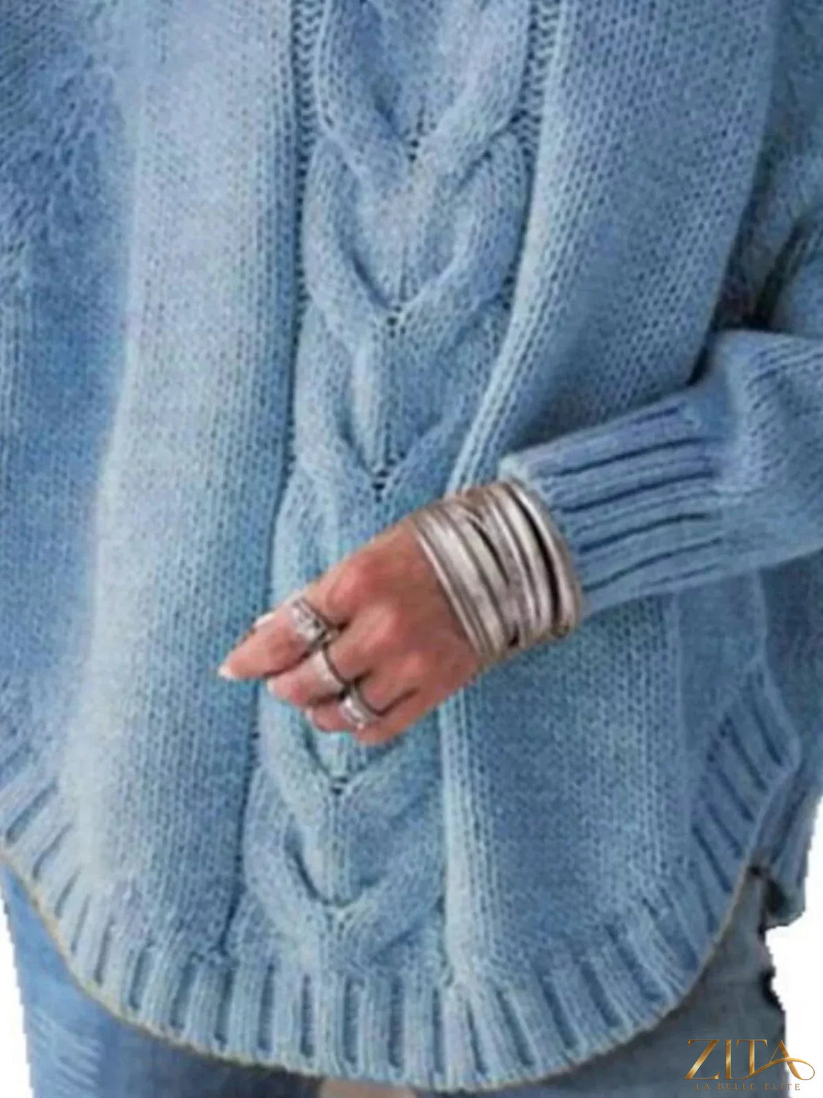 Zita La Belle Elite cable-knit long sleeve sweater in cozy knit fabric, featuring a classic design and ribbed cuffs.