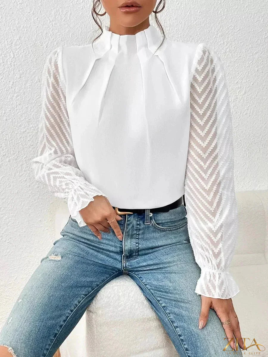 Zita La Belle Elite mock neck blouse with sheer lace sleeves, elegant and stylish, showcasing intricate lace details and a fitted silhouette.