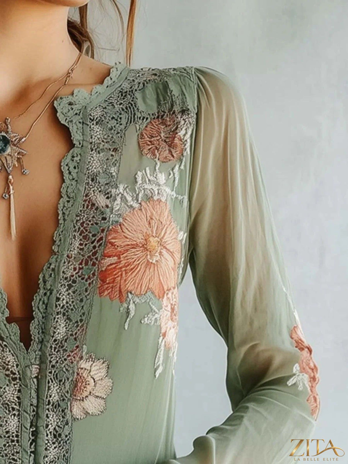 Zita La Belle Elite floral blouse with lace detail, featuring a feminine design and delicate lace accents on the neckline and sleeves.