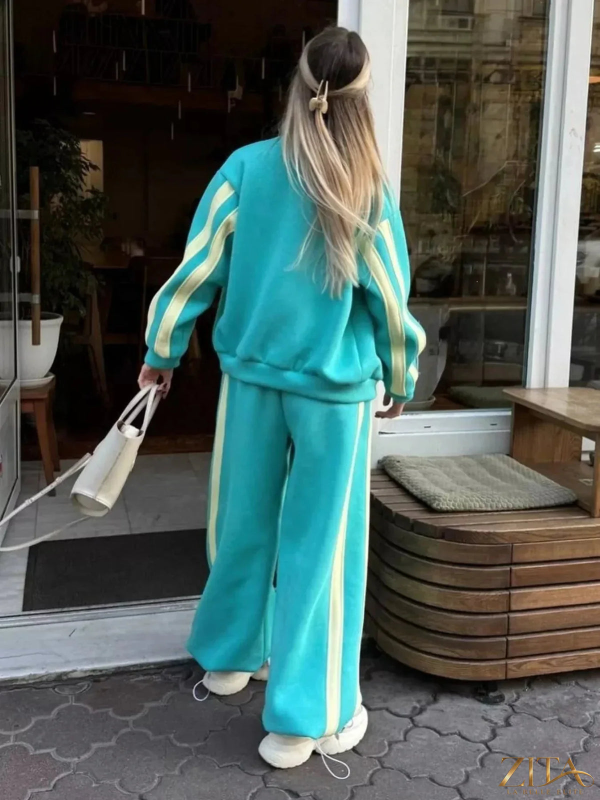 Zita La Belle Elite contrast striped zip-up top and pants set, featuring a stylish coordinated outfit with bold stripe patterns.