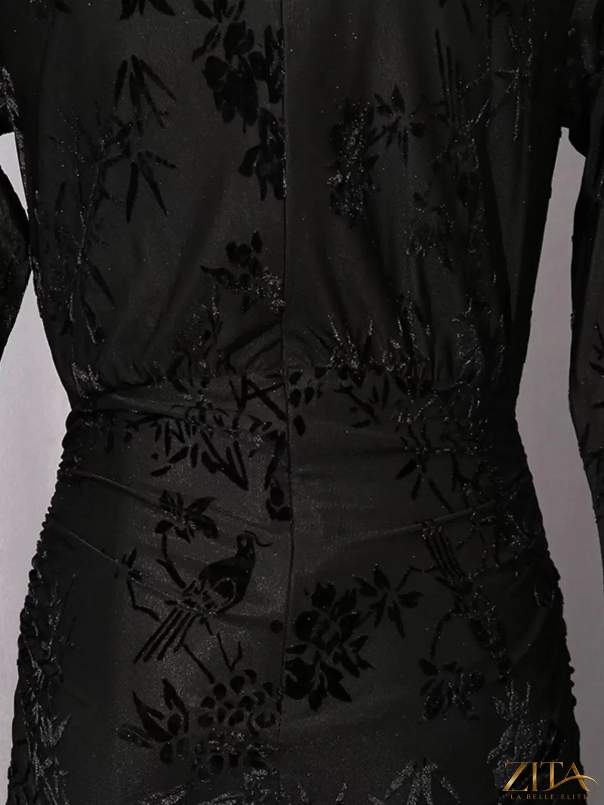 Ruched long sleeve mini dress by Trendsi, featuring a fitted silhouette with gathered fabric and a stylish V-neck.