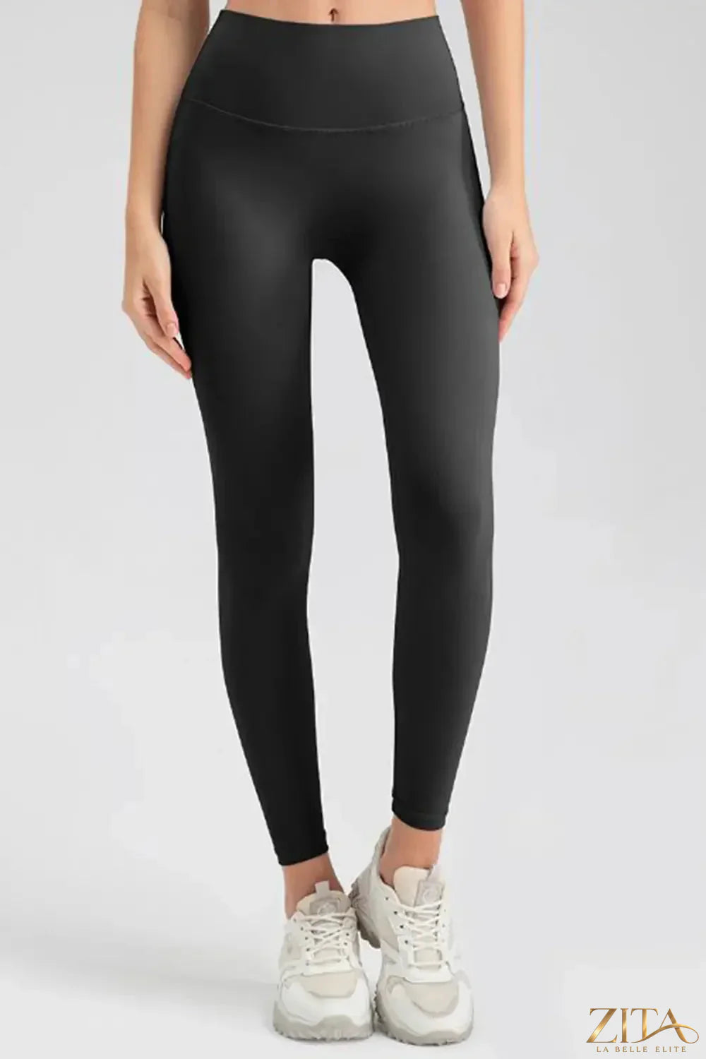 Trendsi wide waistband sport leggings shown in black with a snug fit and stretchy fabric for active wear and comfortable movement.