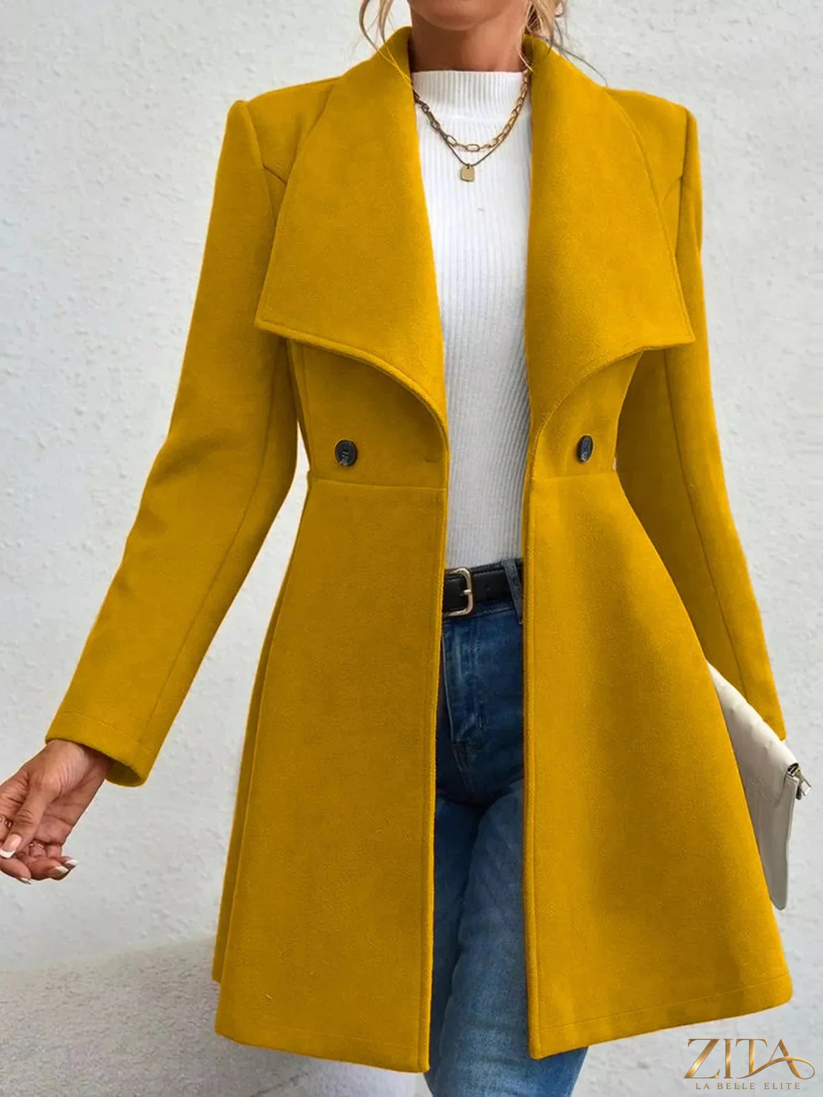 Zita La Belle Elite double-breasted wool blend coat displayed on a hanger, featuring classic design and rich fabric texture.