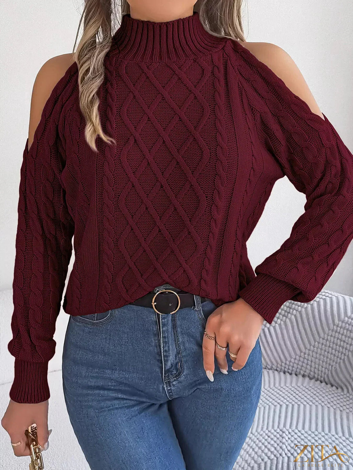 Zita La Belle Elite cold-shoulder cable knit sweater in soft, cozy fabric with stylish cut-out shoulders and intricate knit pattern