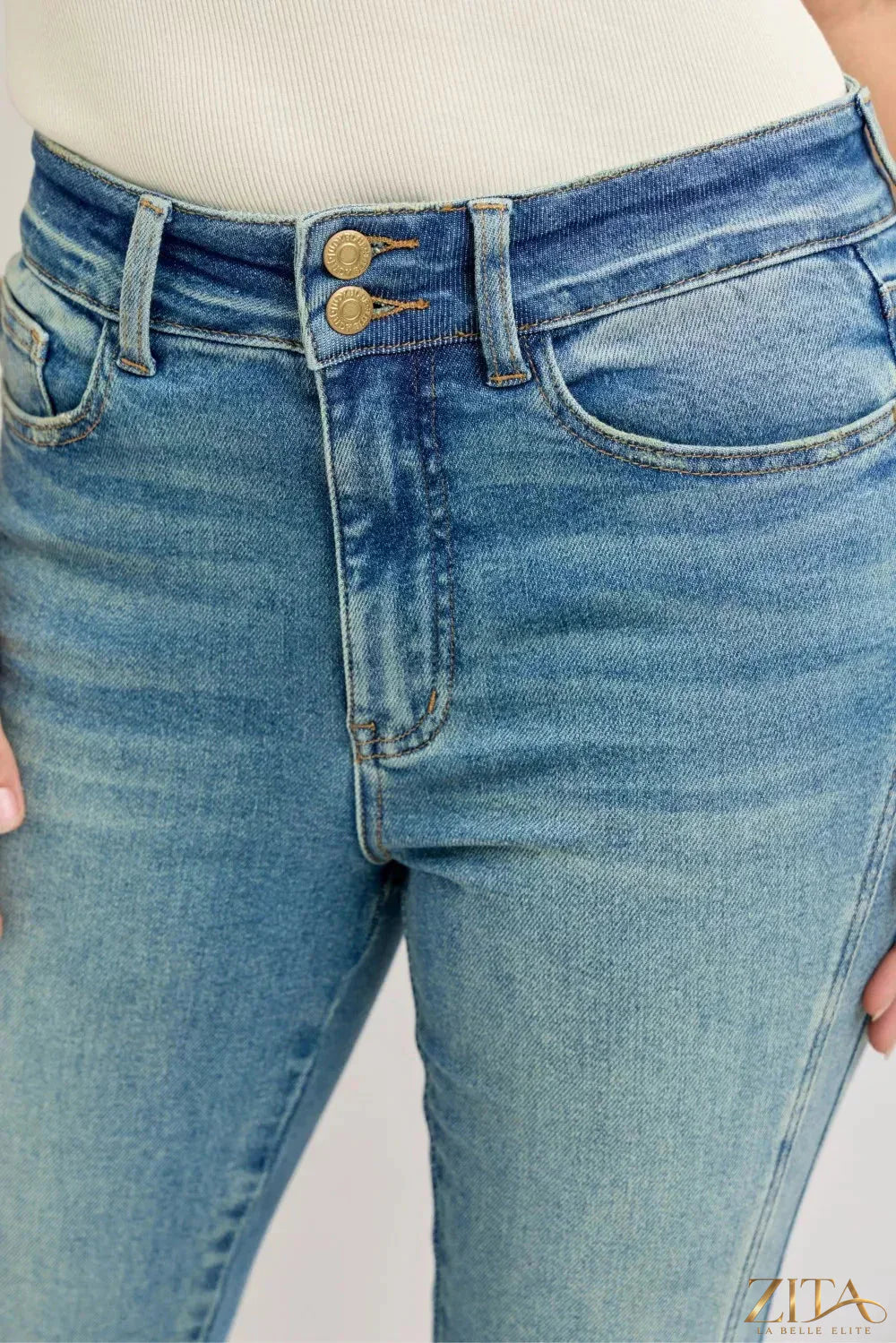 Zita La Belle Elite Judy Blue high waist vintage wash flare jeans with classic five-pocket design and raw hem detail.