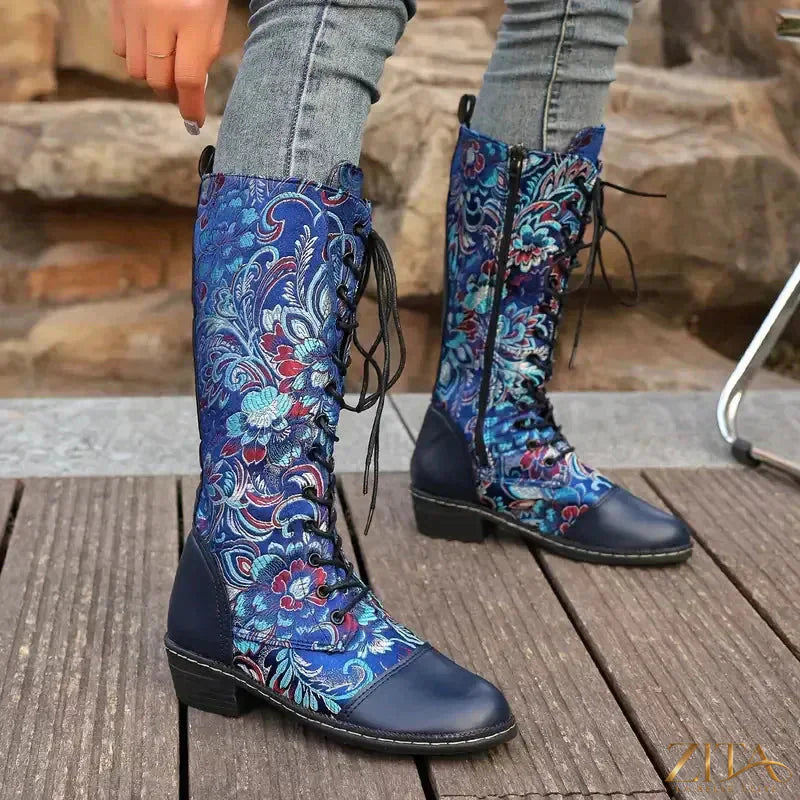 Zita La Belle Elite embroidered lace-up knee-high boots with intricate floral embroidery and stylish design.