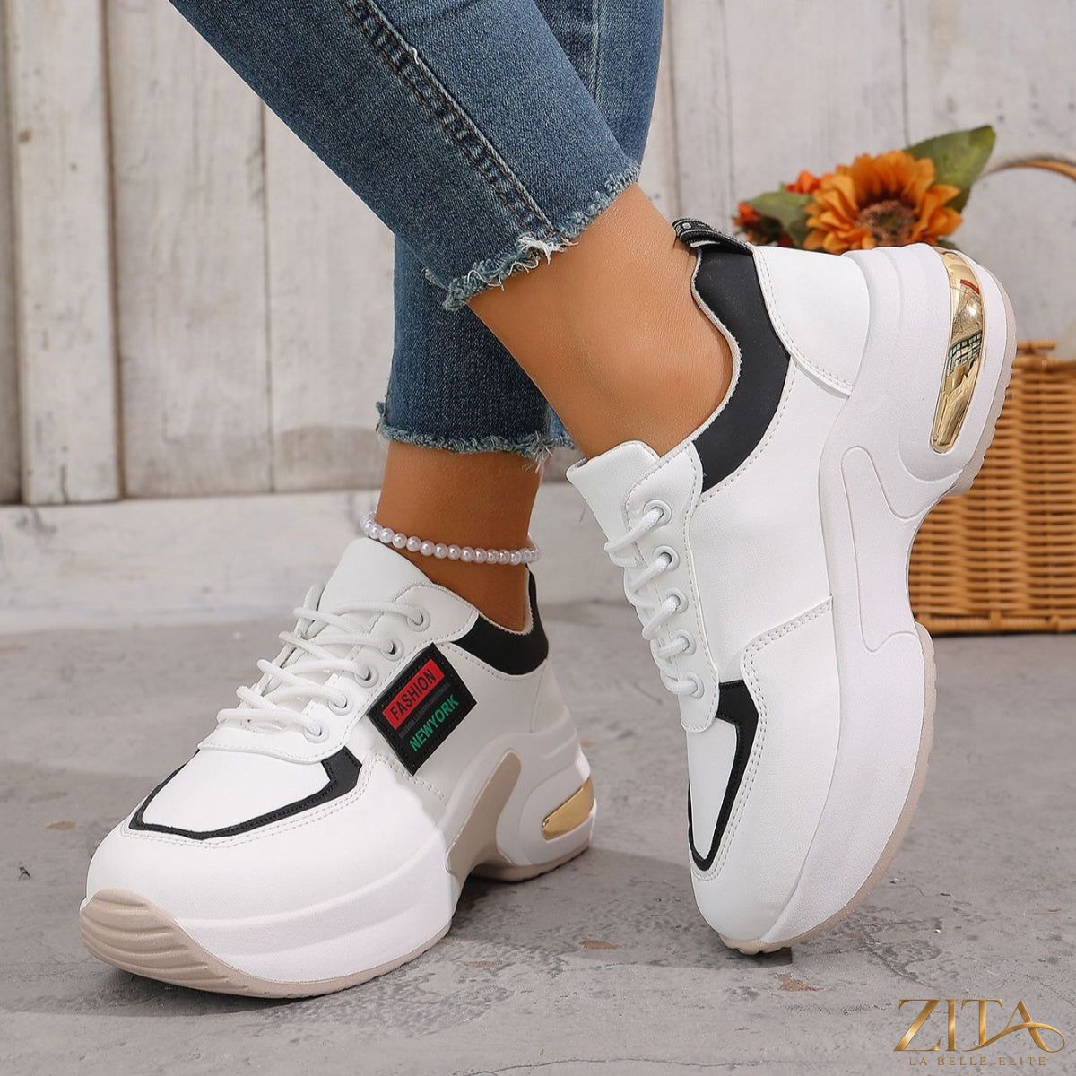 Zita La Belle Elite round toe lace-up sneakers with white and black design, breathable fabric, and sturdy rubber sole.