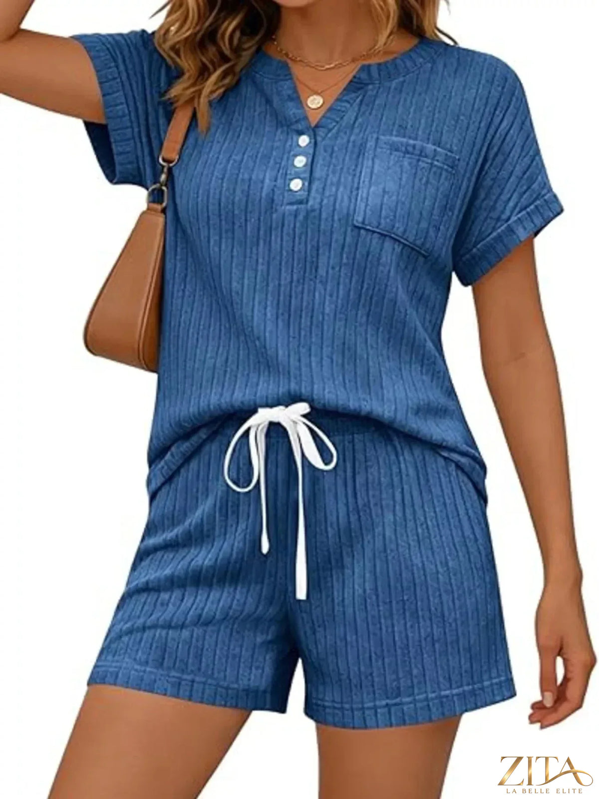 Casual ribbed knit tee and shorts set by Trendsi, featuring a comfortable, stylish matching top and bottom in neutral tones.