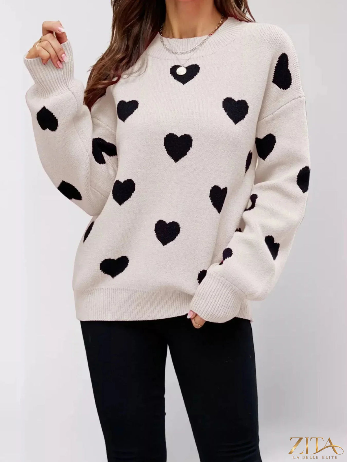 Heart-patterned dropped shoulder sweater by Zita La Belle Elite, featuring cozy knit fabric and relaxed fit with romantic heart design.