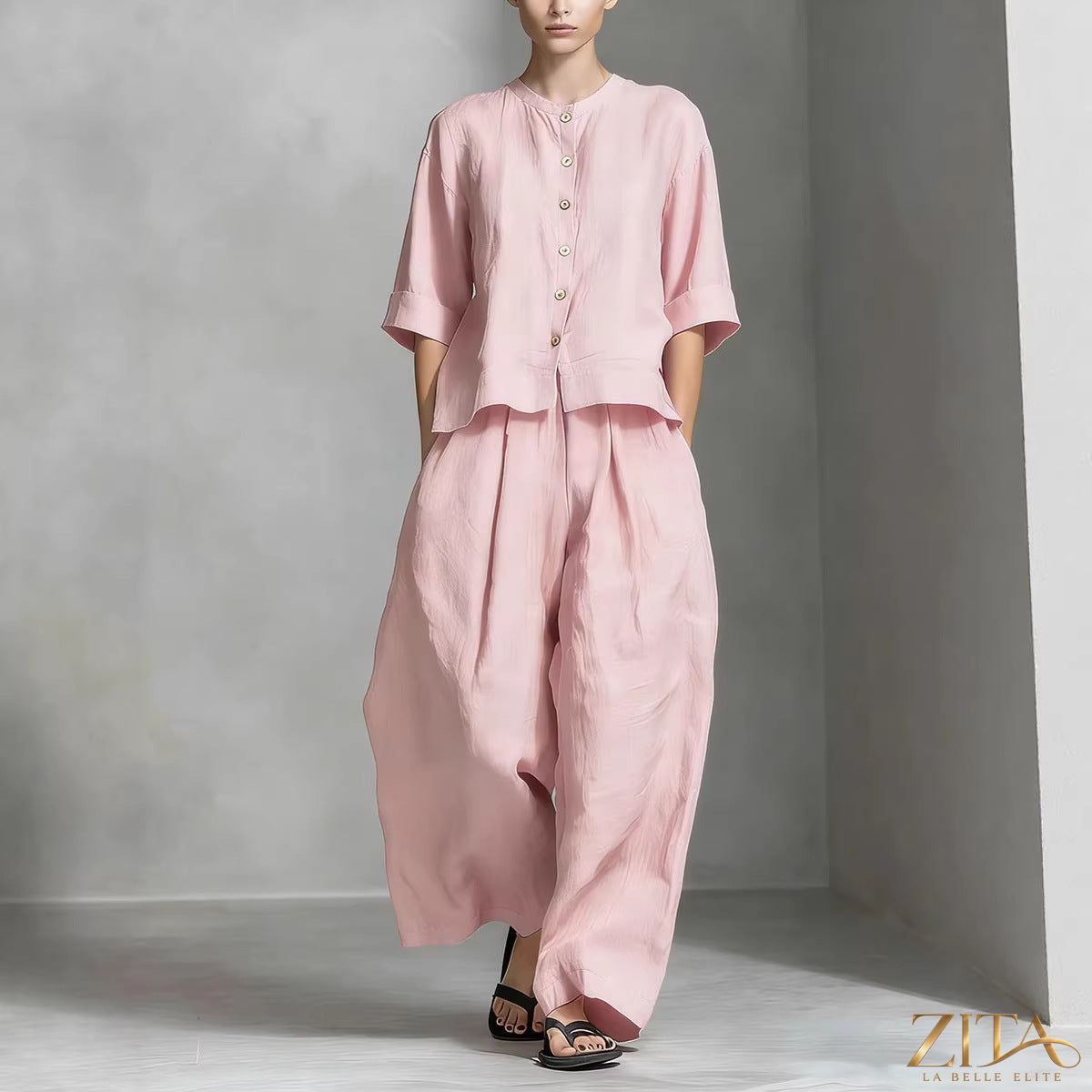 Zita La Belle Elite three-quarter sleeve shirt and loose trousers two-piece set, shown in a stylish, casual outfit.