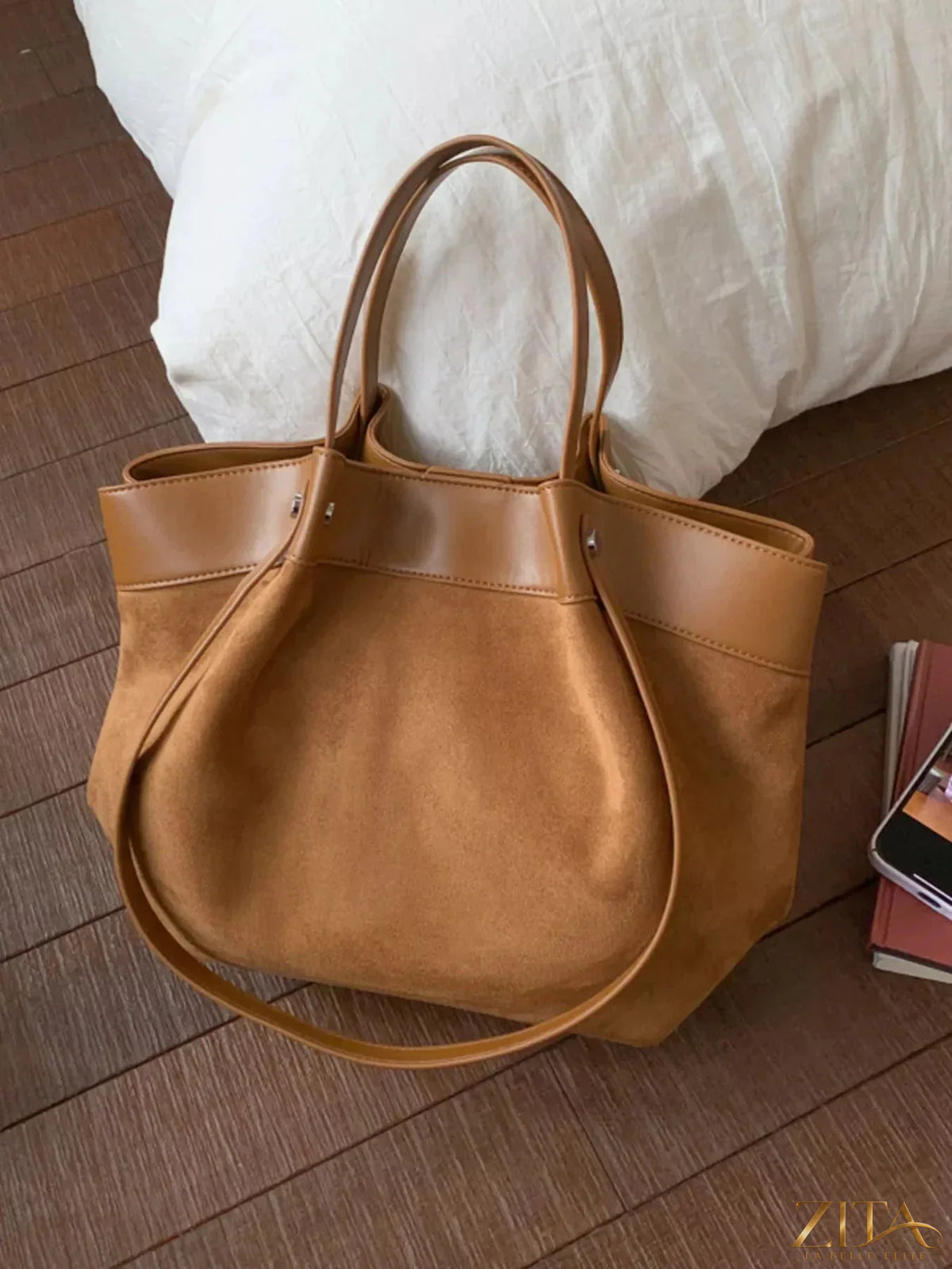 Lightweight classic color tote bag by Zita La Belle Elite, showing its spacious design and durable fabric in a natural setting.