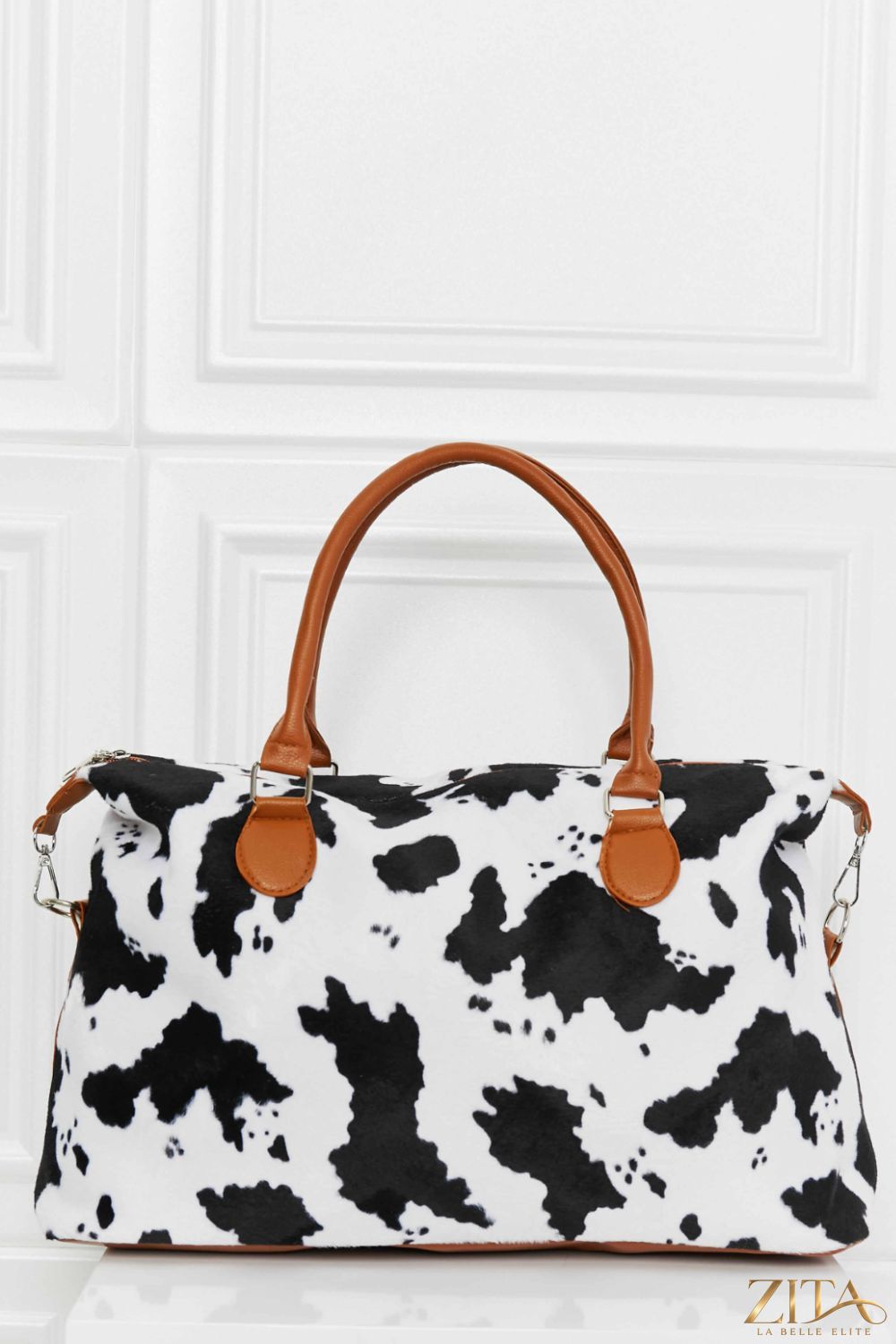 Animal print brushed weekender bag by Zita La Belle Elite with spacious interior and stylish design for travel and weekend trips.
