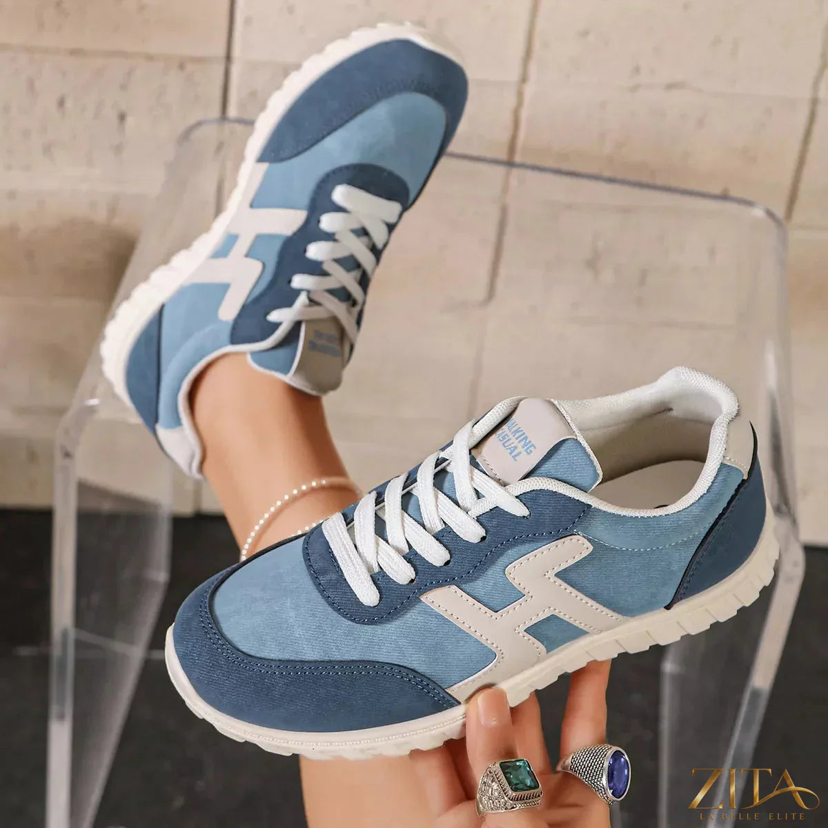 Zita La Belle Elite round toe lace-up sneakers with white soles and stylish design on a white background.