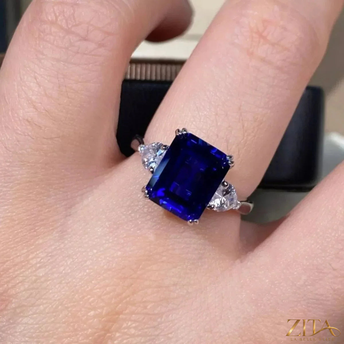 925 sterling silver sapphire geometric ring with blue gemstone and modern design, showcasing a stylish jewelry piece.