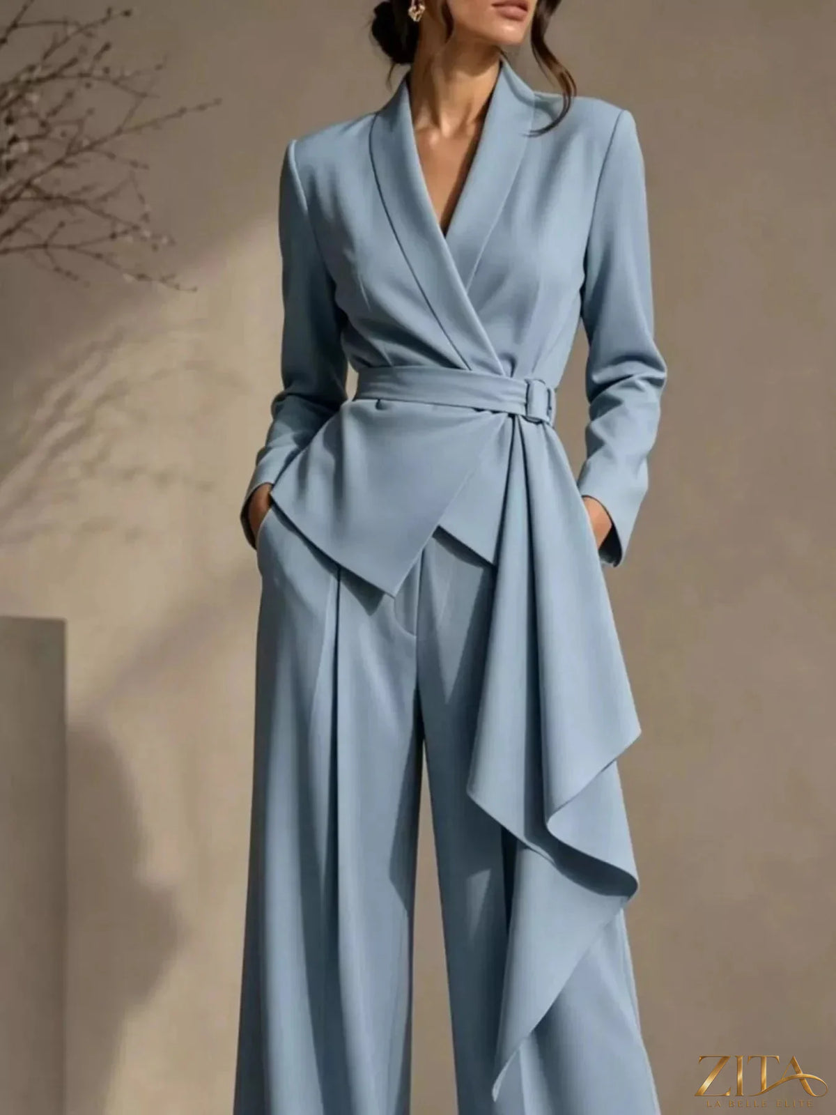 Plus size Zita La Belle Elite belted blazer and wide-leg pants set, featuring a tailored blazer with belt and flowing wide-leg trousers.