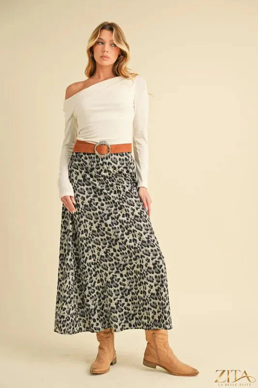 Aemi+Co leopard print midi skirt from Trendsi featuring a flowy design and bold animal print fabric.