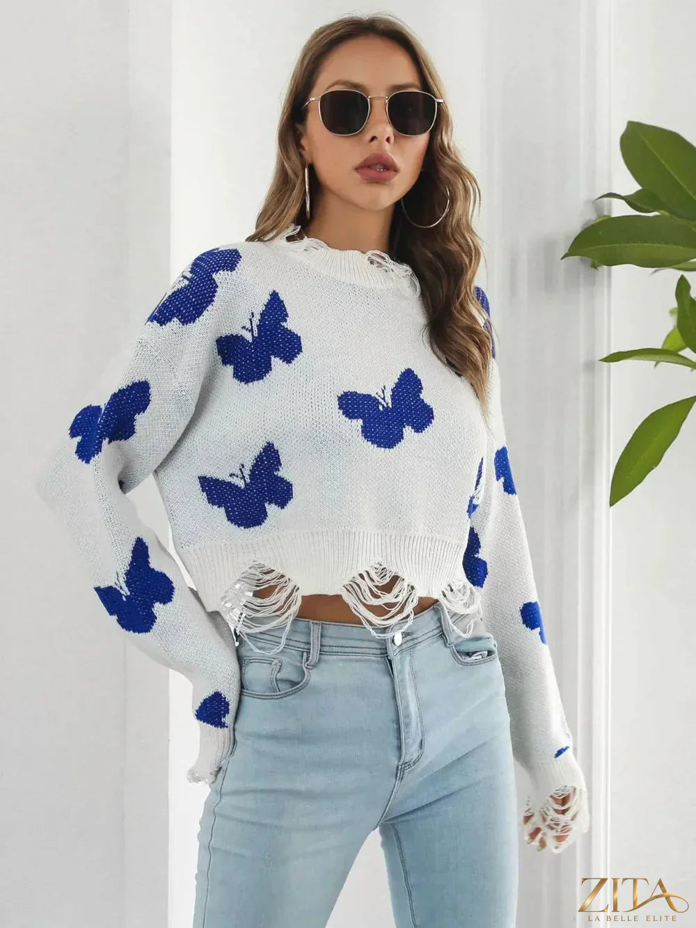 Zita La Belle Elite distressed butterfly cropped sweater with torn details and long sleeves, stylish and casual women's fashion top.