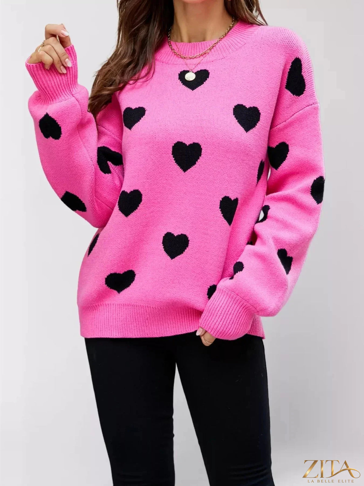 Heart-patterned dropped shoulder sweater by Zita La Belle Elite, featuring a cozy knit with romantic heart designs.