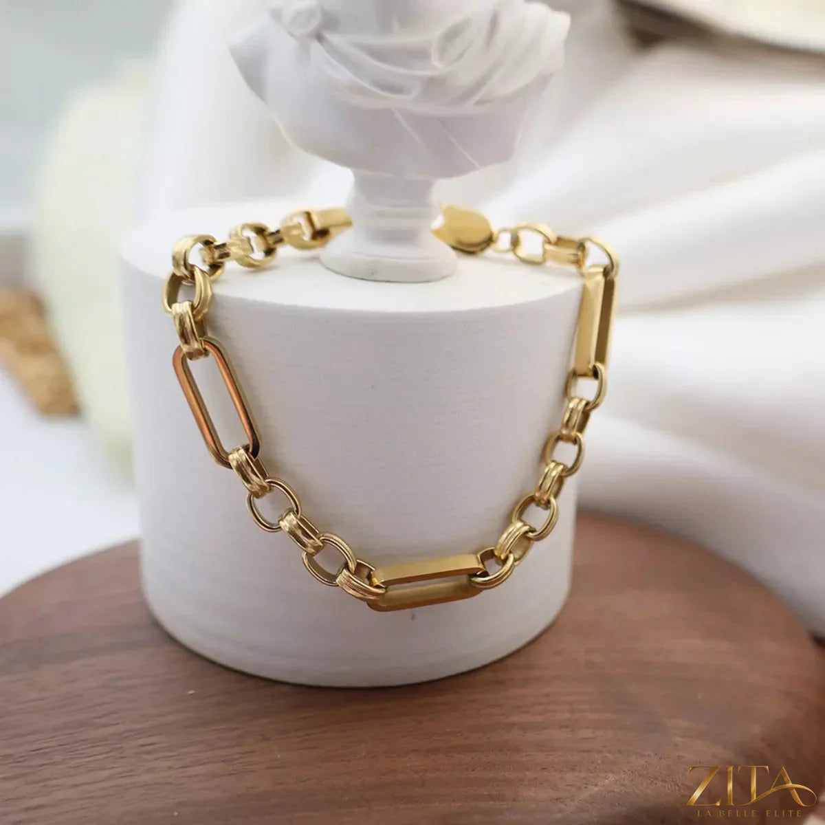 18K gold-plated chunky chain link bracelet by Zita La Belle Elite, featuring bold interconnected gold links on a white background.