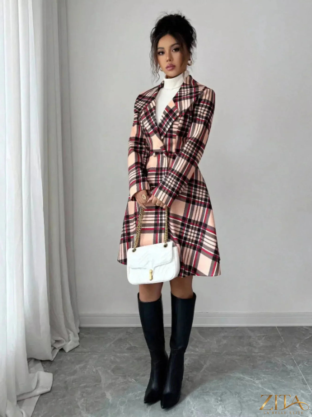 Zita La Belle Elite plaid button-up long sleeve coat hanging on a wooden hanger showing its pattern and classic design.