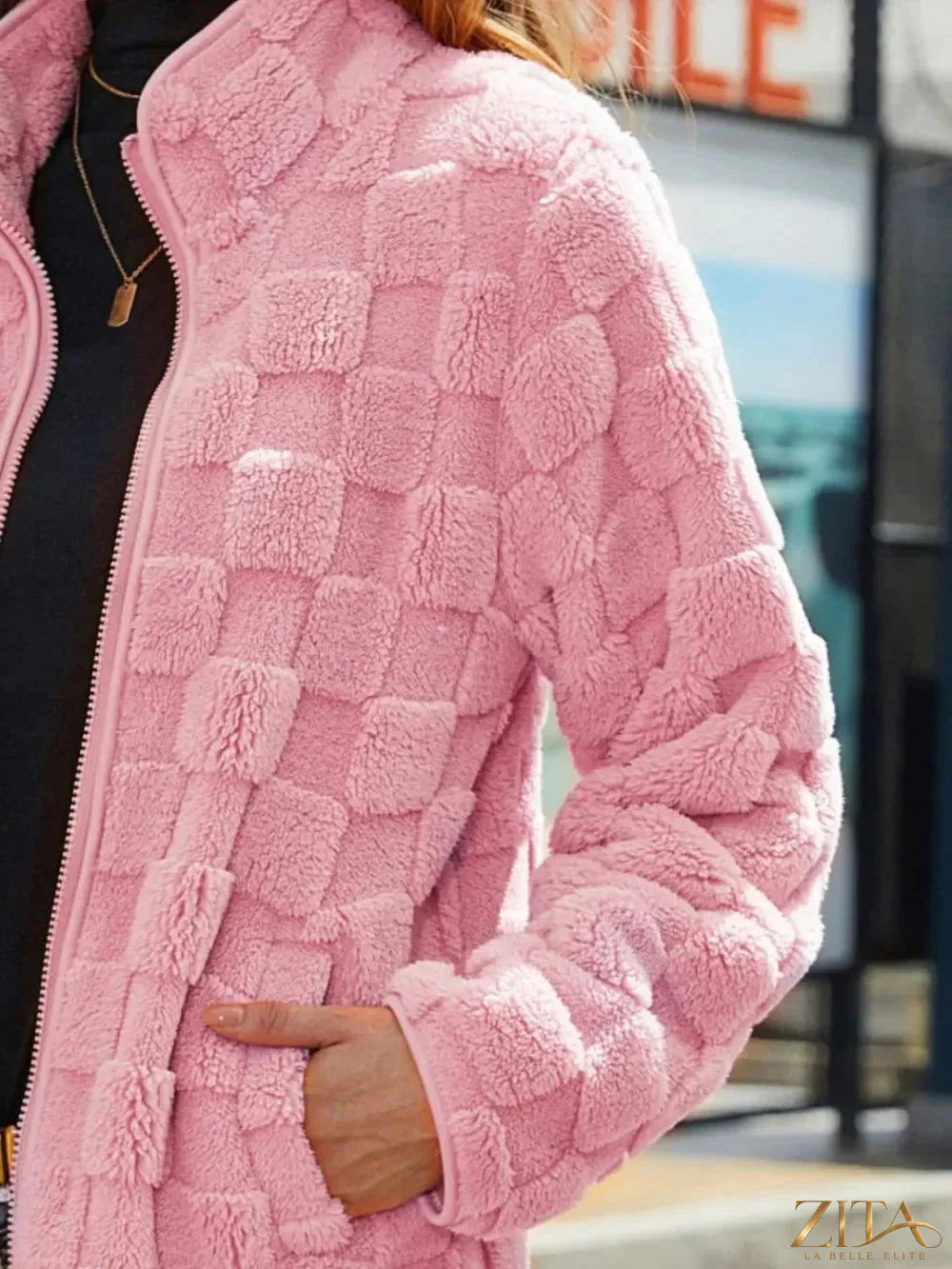 Fuzzy checkered zip-up jacket by Zita La Belle Elite featuring a cozy, stylish design with a front zipper and checkered pattern.