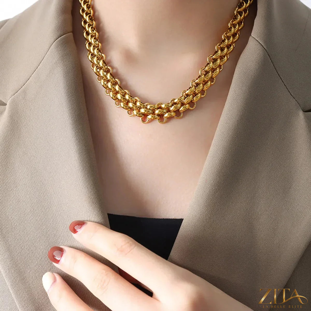 Gold chain link jewelry set featuring a necklace and bracelet, stylish Trendsi accessory with bold, interconnected links.