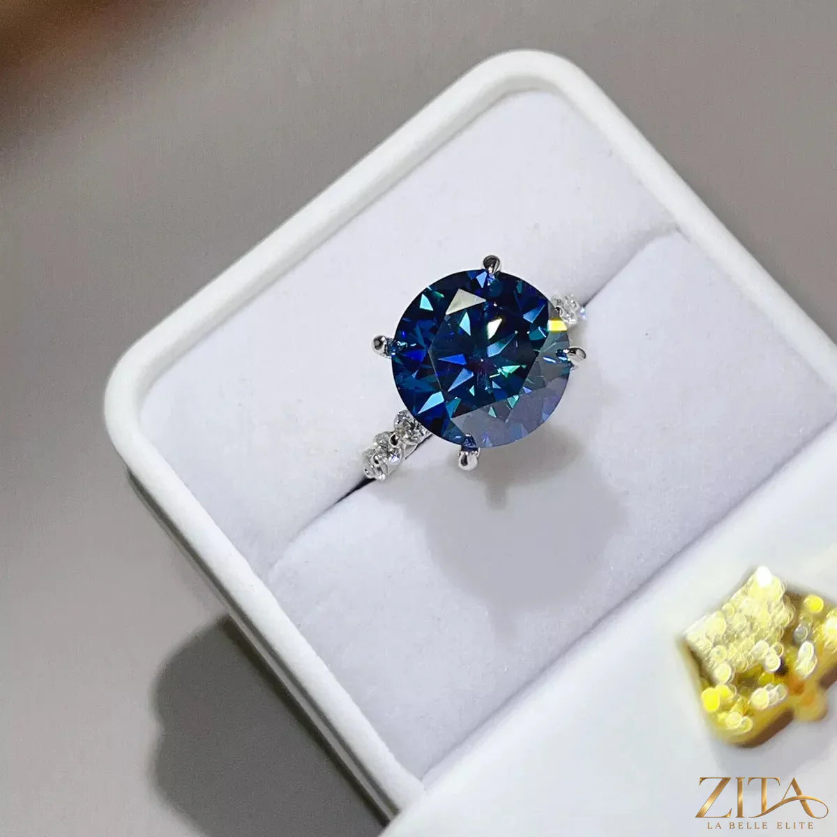 Sterling silver moissanite ring with a 10-carat gemstone, featuring a sleek design and sparkling brilliance.