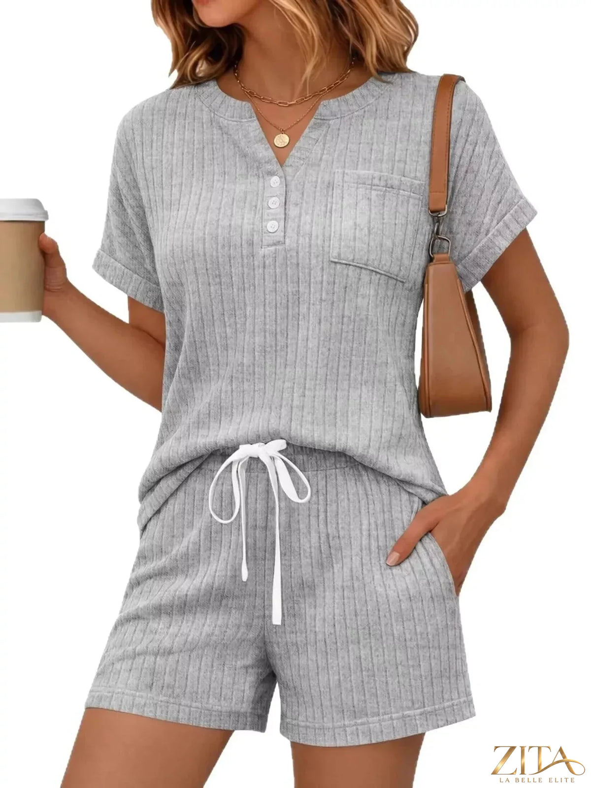 Casual ribbed knit tee and shorts set by Trendsi, featuring a comfortable, stylish matching top and bottom in neutral tones.