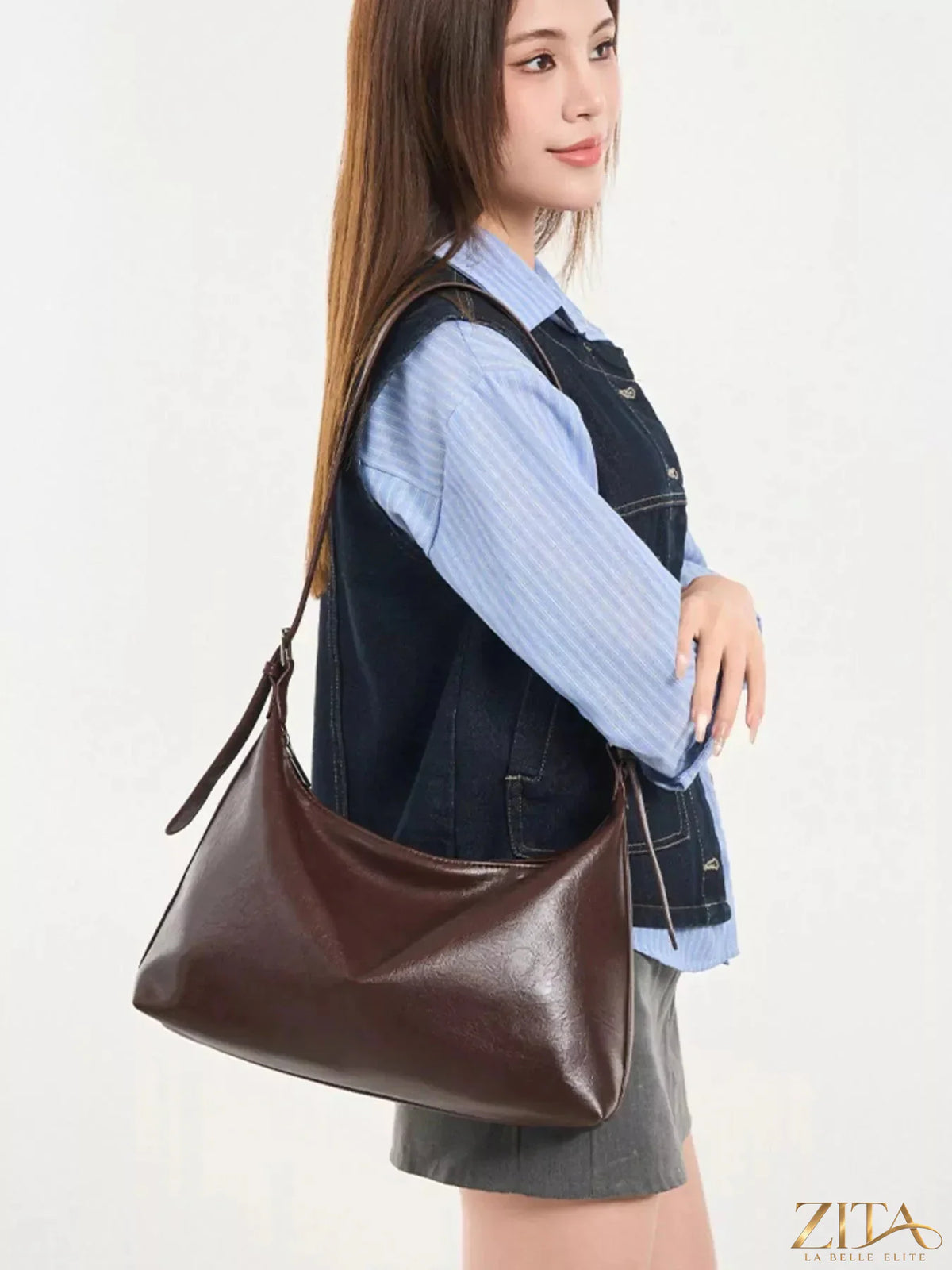 Zita La Belle Elite PU leather hobo crossbody bag with adjustable strap, showcasing its sleek design and textured surface.
