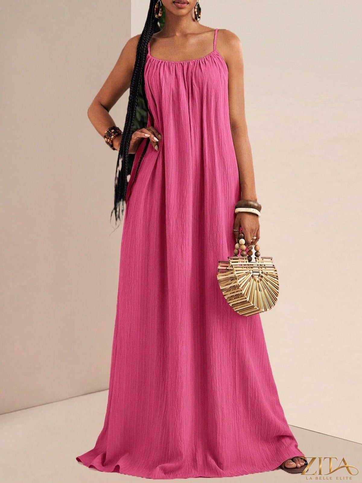 Flowy spaghetti strap maxi dress by Zita La Belle Elite, featuring a lightweight, elegant design perfect for summer or special occasions.